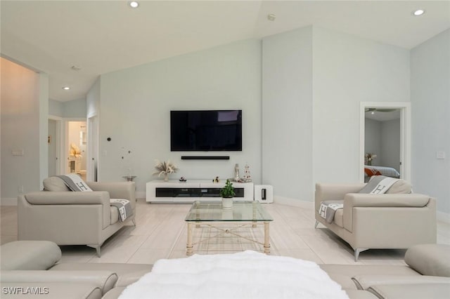 tiled living room with lofted ceiling