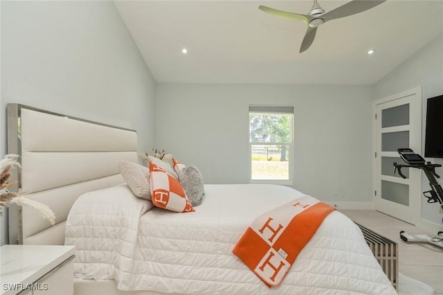 bedroom with ceiling fan and lofted ceiling