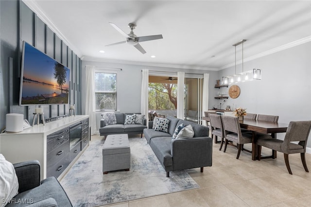 tiled living room with crown molding and ceiling fan