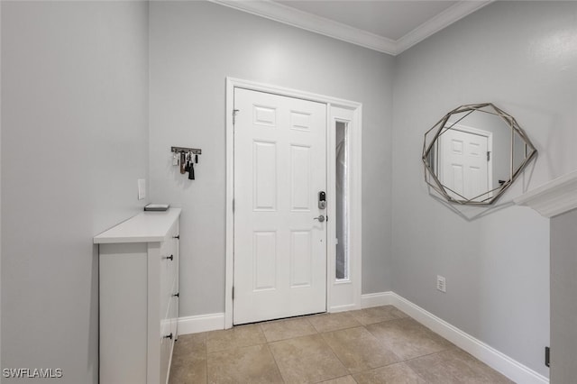 foyer entrance with crown molding and light tile patterned flooring