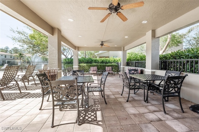 view of patio / terrace featuring ceiling fan