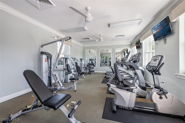 workout area featuring crown molding and ceiling fan