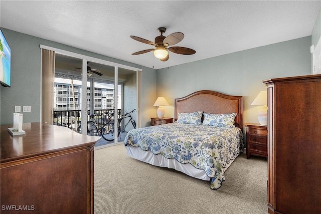 bedroom with access to exterior, carpet, a textured ceiling, and ceiling fan