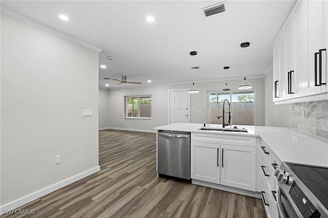 kitchen featuring white cabinets, a healthy amount of sunlight, and stainless steel appliances