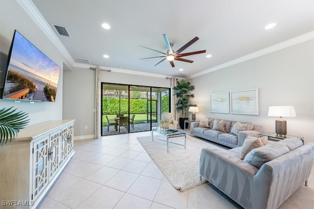 living room featuring ceiling fan, light tile patterned flooring, and ornamental molding