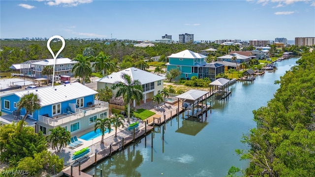 bird's eye view with a water view