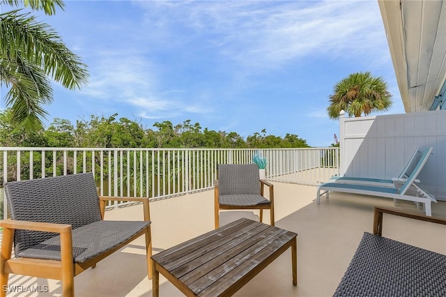 view of patio with a balcony