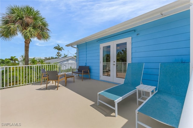 view of patio featuring french doors