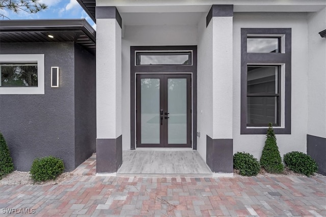 entrance to property featuring french doors