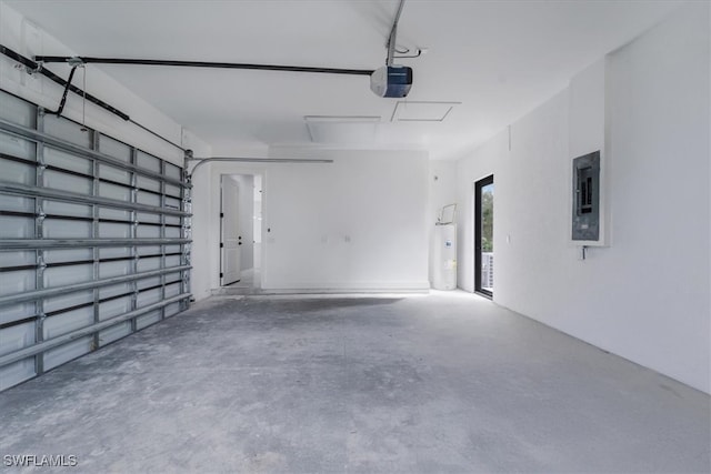 garage with a garage door opener, electric panel, and water heater