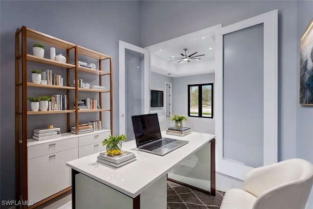 home office featuring ceiling fan and french doors