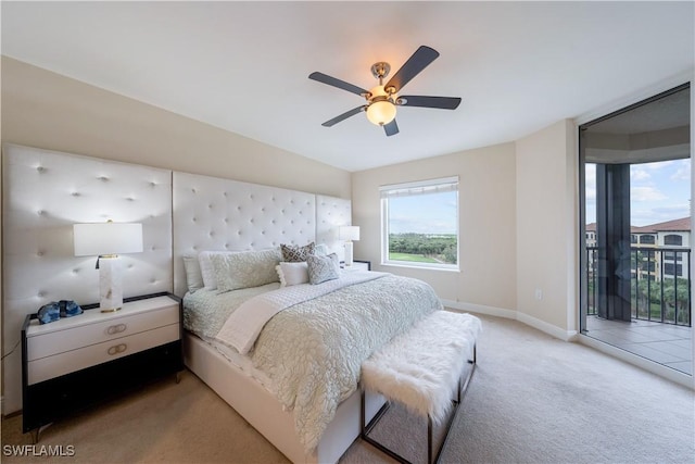 23540 Via Veneto Blvd Unit 605, Estero, FL 34134 - bedroom featuring access to outside, light colored carpet, baseboards, and a ceiling fan