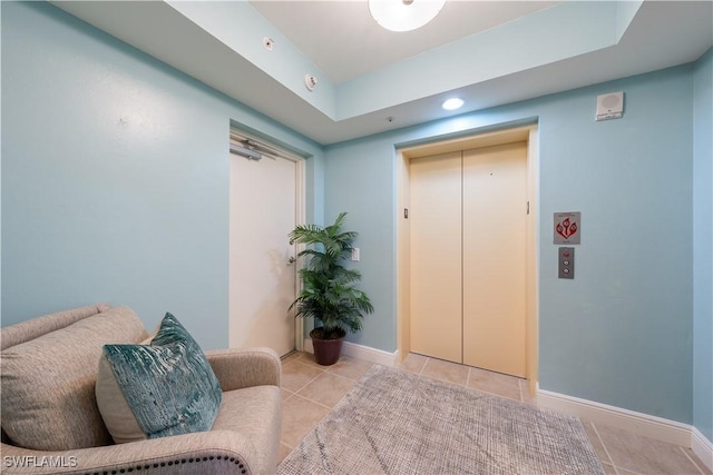 23540 Via Veneto Blvd Unit 605, Estero, FL 34134 - sitting room with elevator, tile patterned flooring, recessed lighting, and baseboards