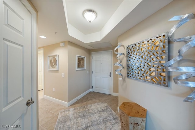 23540 Via Veneto Blvd Unit 605, Estero, FL 34134 - foyer entrance featuring light tile patterned floors and baseboards