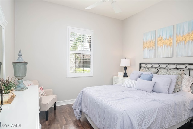 bedroom with ceiling fan and dark wood-type flooring