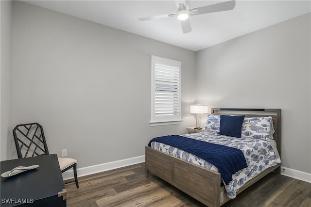 bedroom featuring ceiling fan and dark hardwood / wood-style flooring