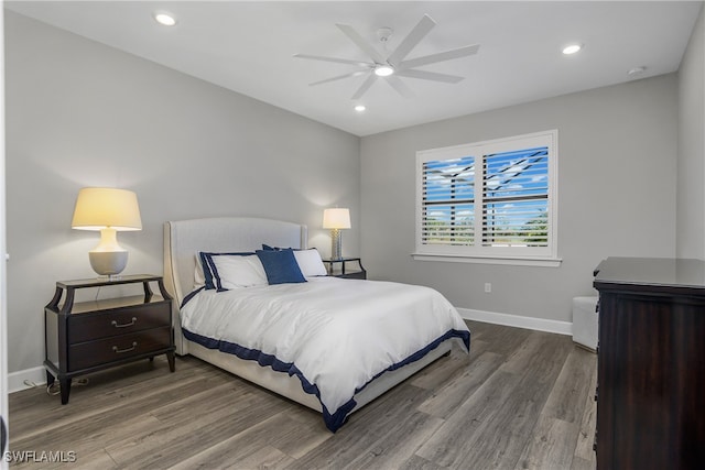 bedroom featuring ceiling fan and hardwood / wood-style floors