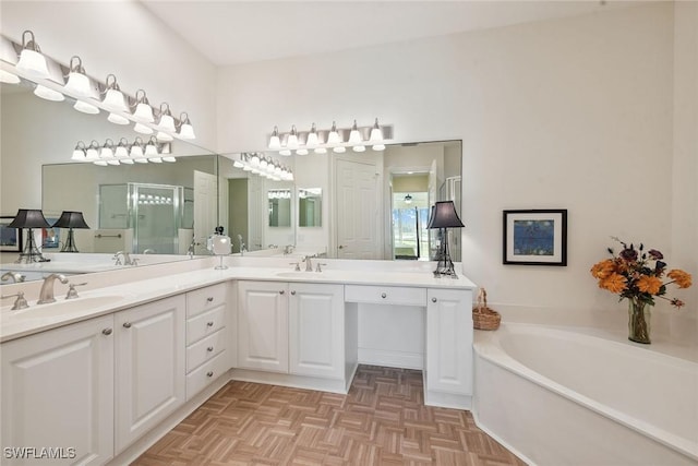 3053 Aviamar Cir Unit 101, Naples, FL 34114 - bathroom featuring a shower stall, a bath, and double vanity
