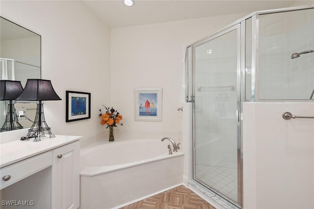 3053 Aviamar Cir Unit 101, Naples, FL 34114 - full bathroom with a bath, vanity, and a shower stall