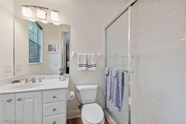 3053 Aviamar Cir Unit 101, Naples, FL 34114 - full bath with vanity, a shower stall, and toilet