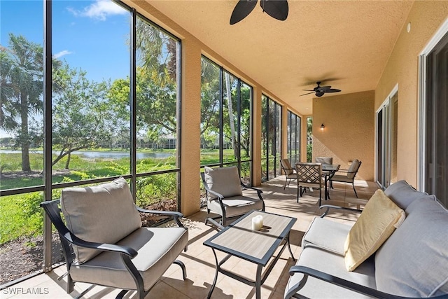 3053 Aviamar Cir Unit 101, Naples, FL 34114 - sunroom / solarium with ceiling fan, a water view, outdoor lounge area, and outdoor dining area