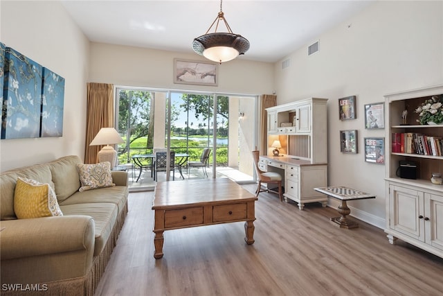 living room with light hardwood / wood-style floors