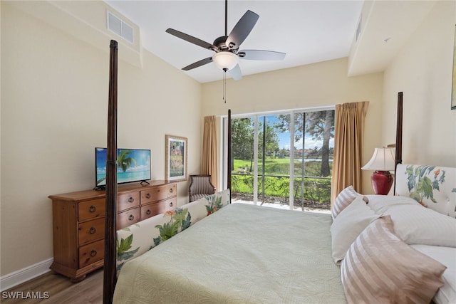 bedroom featuring access to exterior, wood-type flooring, and ceiling fan