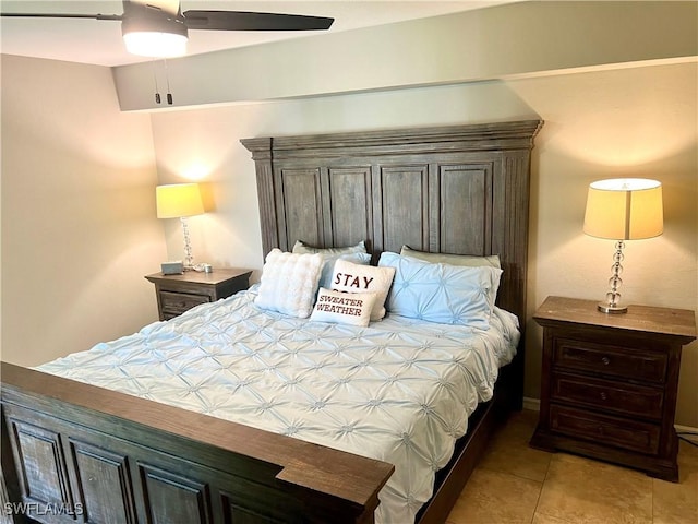 tiled bedroom with ceiling fan