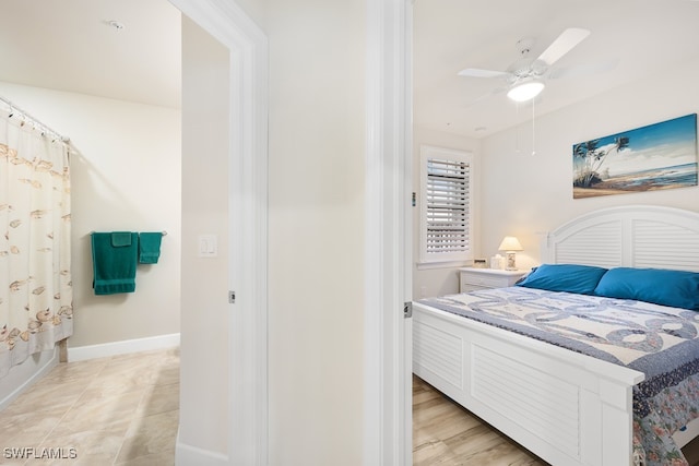 bedroom featuring ceiling fan and light tile patterned floors