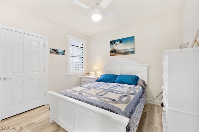 bedroom with ceiling fan and light hardwood / wood-style flooring