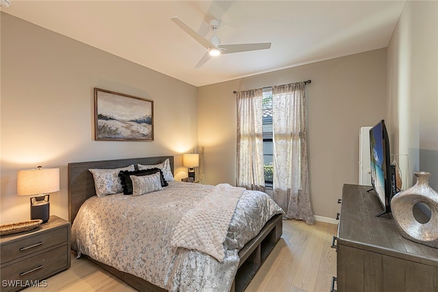 bedroom featuring light hardwood / wood-style flooring and ceiling fan