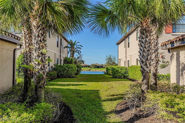 view of yard with a water view