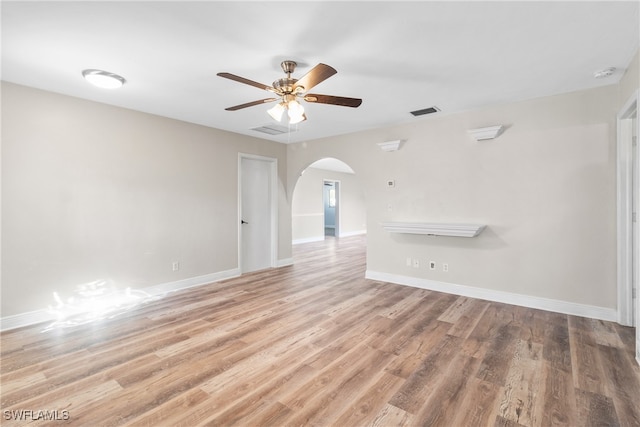 spare room with light hardwood / wood-style floors and ceiling fan