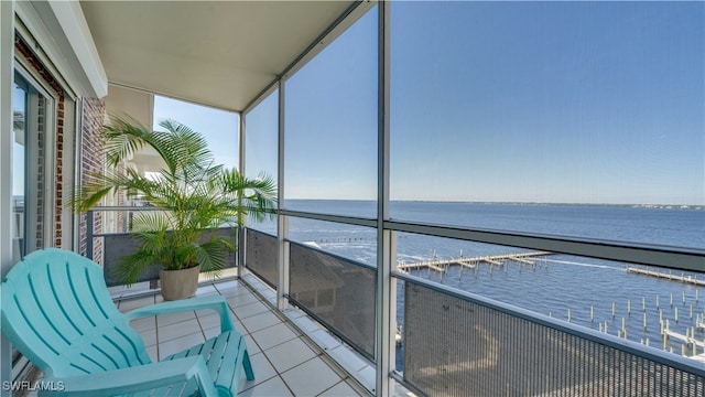 balcony featuring a water view