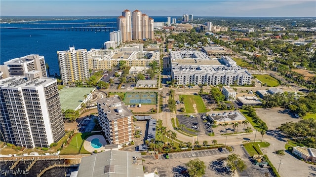 aerial view featuring a view of city and a water view