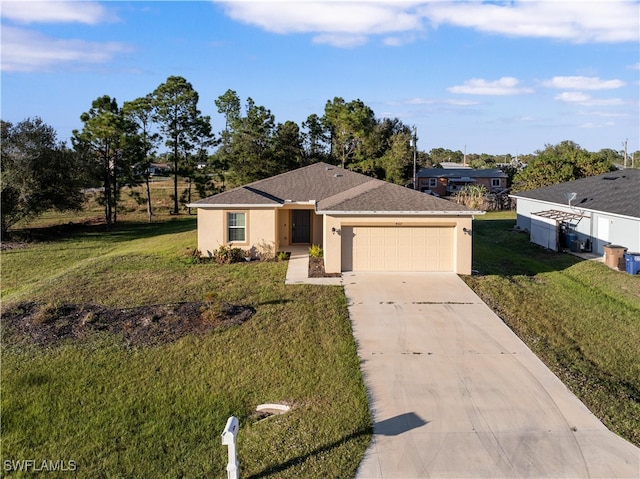 ranch-style house featuring a front lawn and a garage