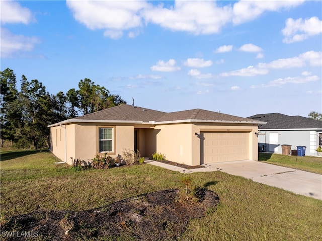 ranch-style home featuring a garage and a front lawn