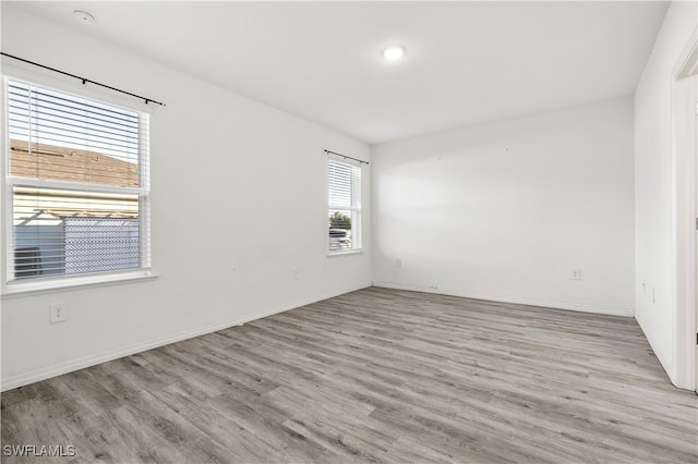 empty room featuring light wood-type flooring