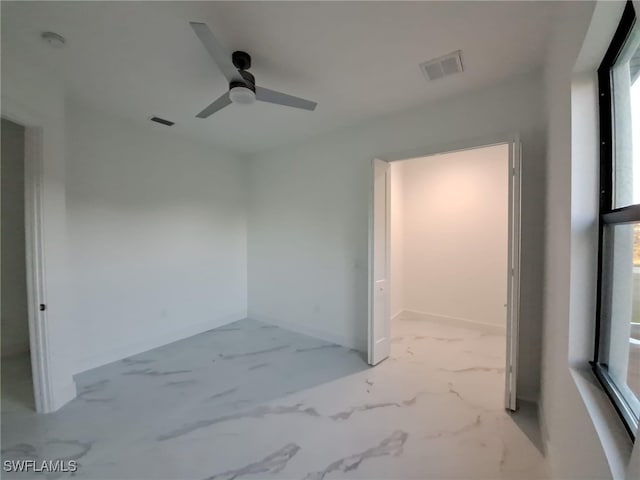 empty room with ceiling fan