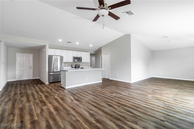 unfurnished living room with lofted ceiling, dark wood-type flooring, and ceiling fan