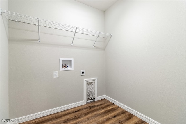 laundry area with hookup for an electric dryer, hardwood / wood-style floors, and washer hookup