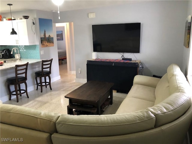 living room featuring sink