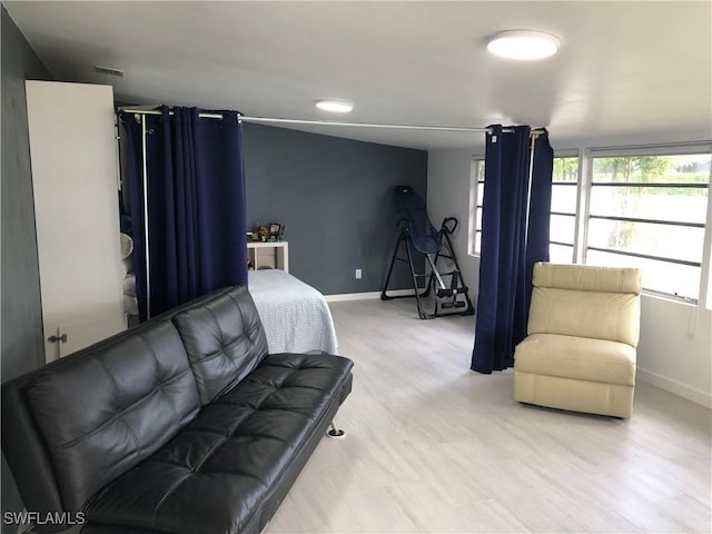 bedroom featuring light wood-type flooring