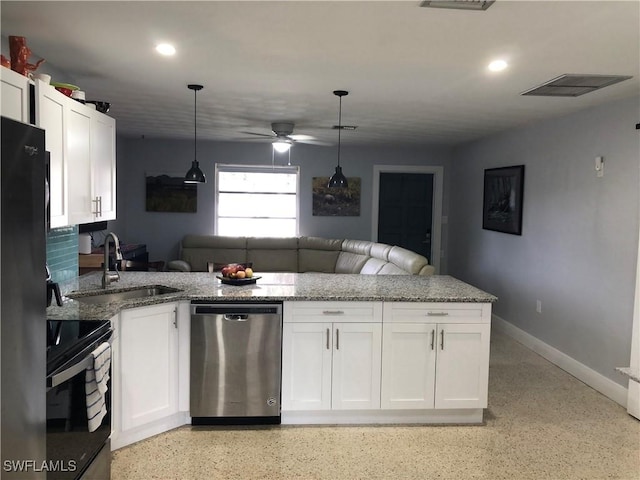 kitchen featuring white cabinetry, black appliances, and decorative light fixtures