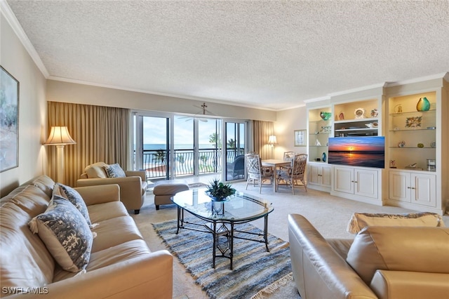 carpeted living room with a textured ceiling and crown molding