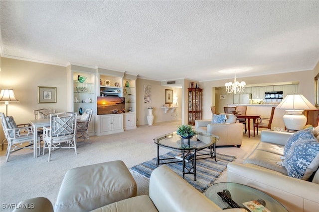 carpeted living room with a notable chandelier, ornamental molding, and a textured ceiling