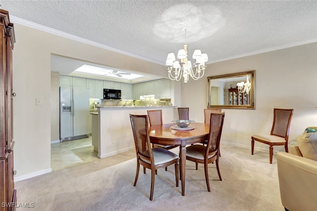 dining area featuring light colored carpet, ornamental molding, and a textured ceiling