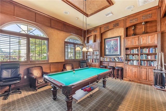 rec room with carpet flooring, built in features, wood walls, and pool table