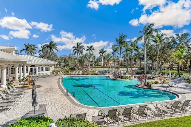 view of pool featuring a patio area