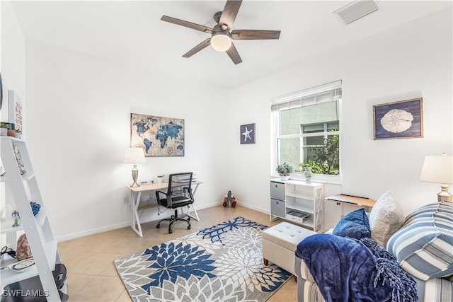 office space featuring ceiling fan and light tile patterned flooring